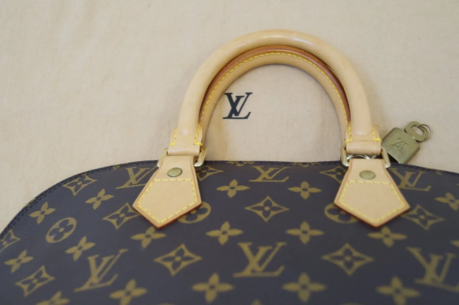 LOUIS VUITTON Monogram Canvas Alma PM Satchel Bag